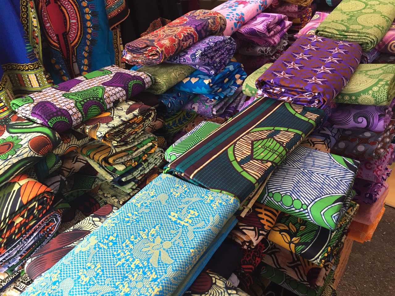 A variety of local textiles for sale at the market