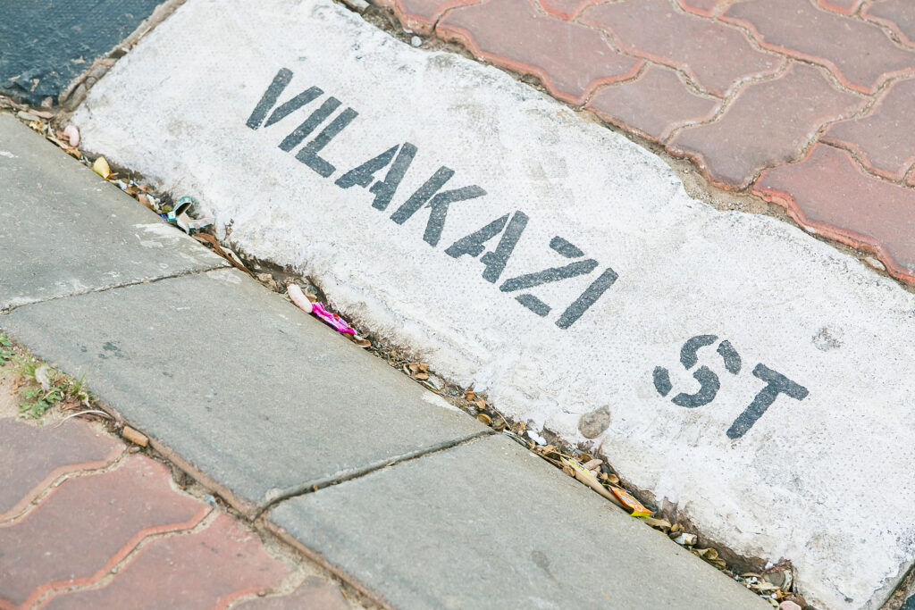 Johannesburg, South Africa - October 27, 2016: Vilakazi Street painted road sign outside Nelson Mandela's house in Soweto