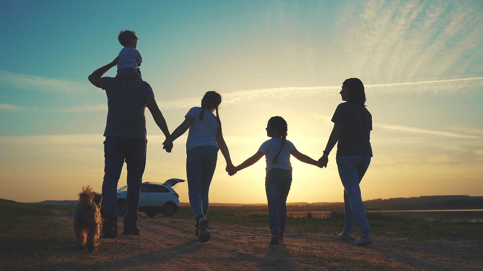 Happy family outdoors in a park on a South Africa road trip
