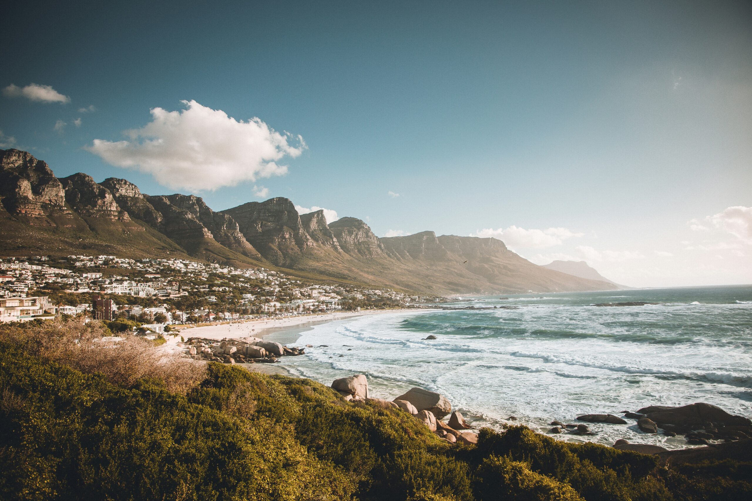 Camps Bay beach and beachfront with the Twelve Apostles mountain range, Cape Town